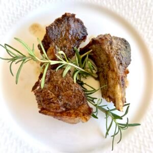 Pasture Raised Lamb, lamb chops, braised in a pan with rosemary,